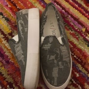 Distressed grey slip on sneakers